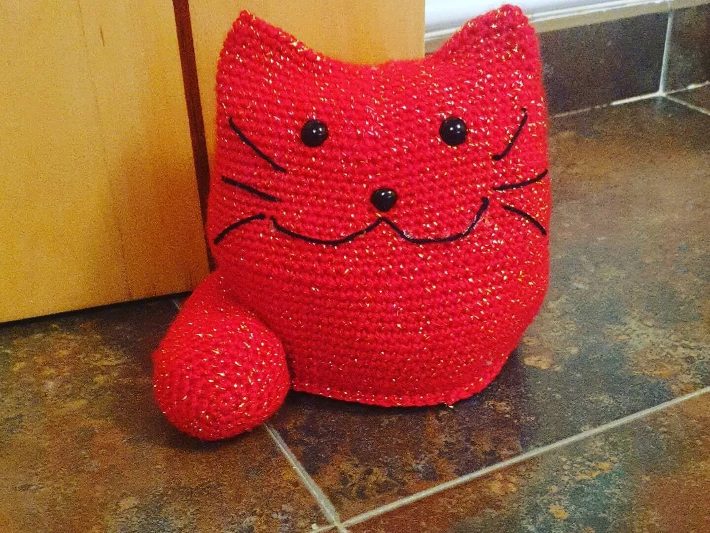Sujeta puerta Gato
