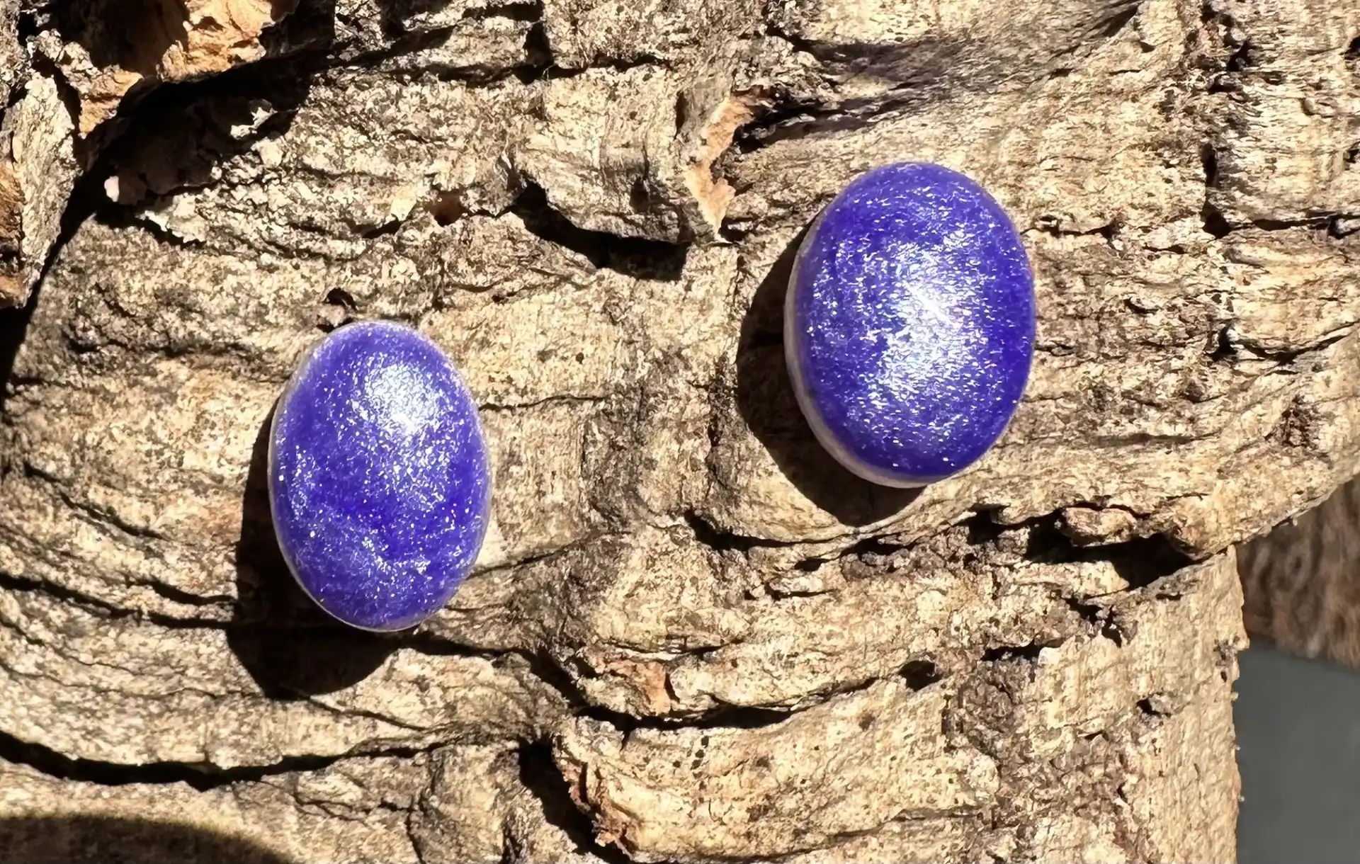 Pendientes botón morado